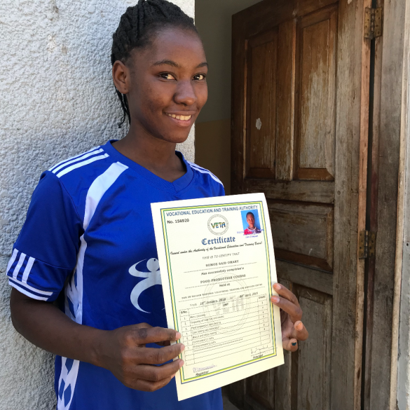 Young lady with her professional diploma.